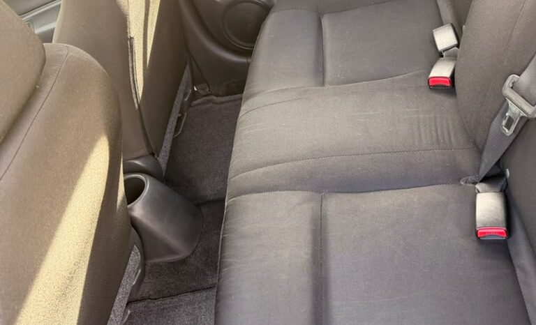
								Nissan Versa full									